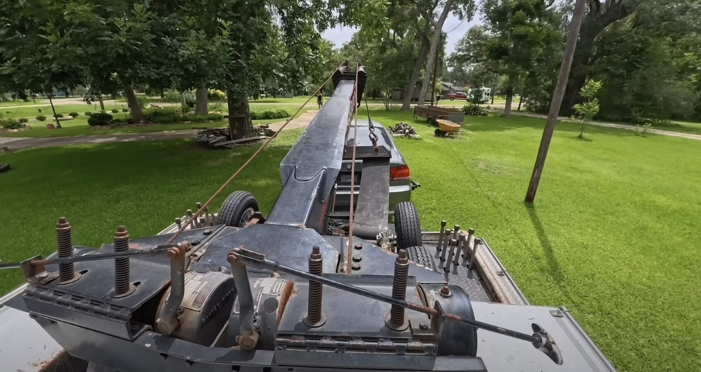 Overhead view of a professional flatbed towing truck in Erie, CO